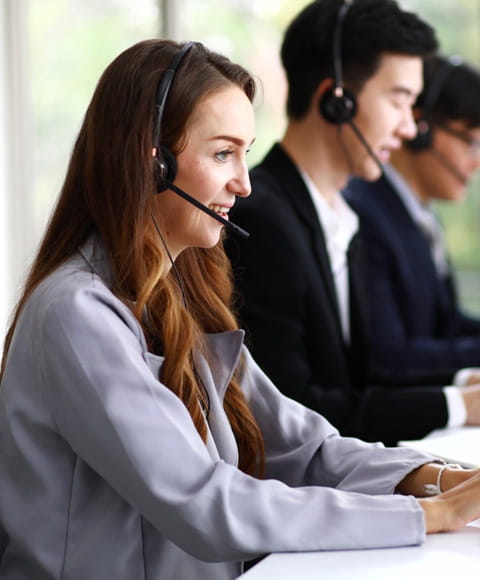 Female support team member wearing a headset